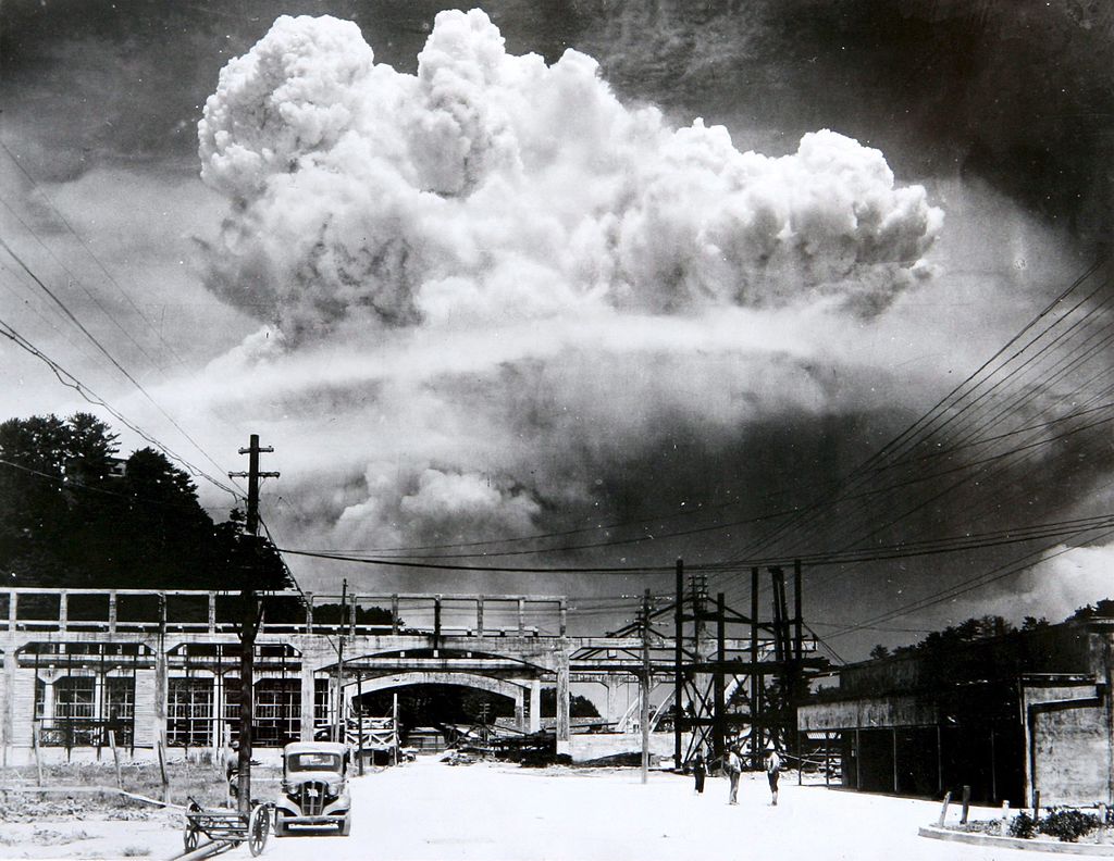 A mushroom cloud forming over Nagasaki's sky shortly after the explosion