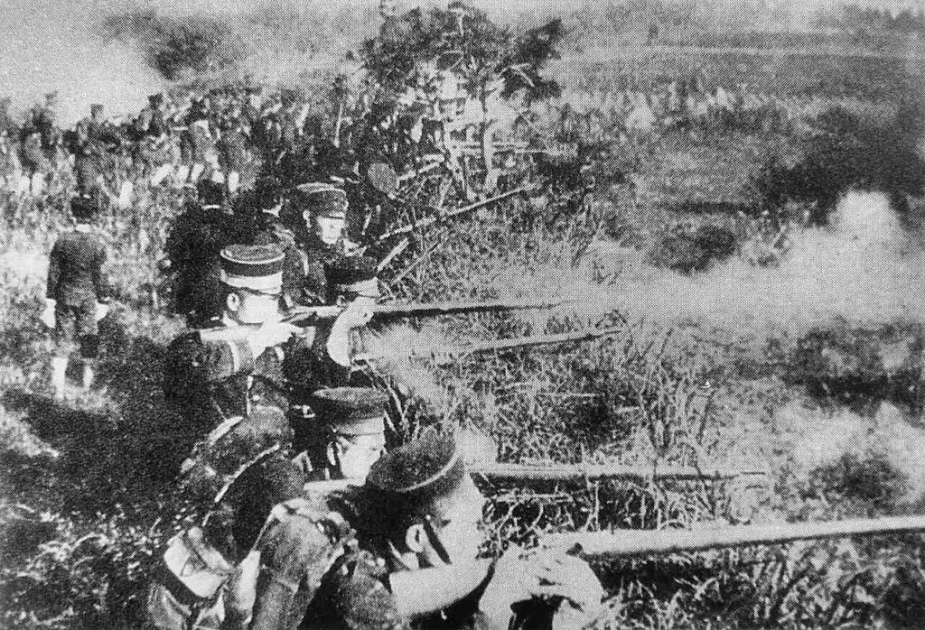 Japanese soldiers opening fire on the Qing army during the Sino-Japanese war