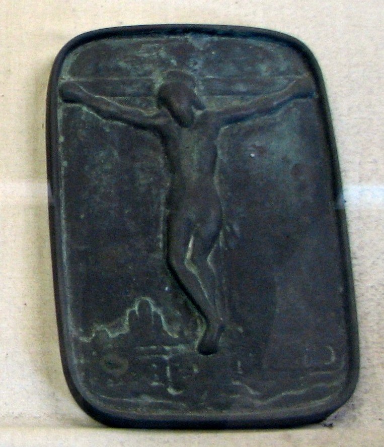 A copper pad depicting the image of Jesus Christ